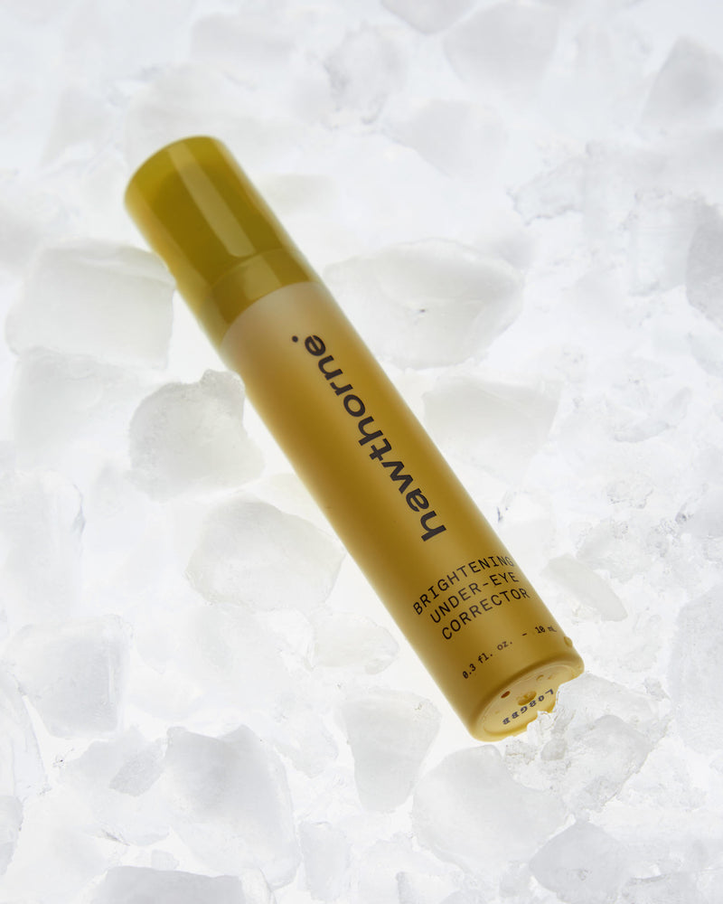brightening eye cream lying on ice