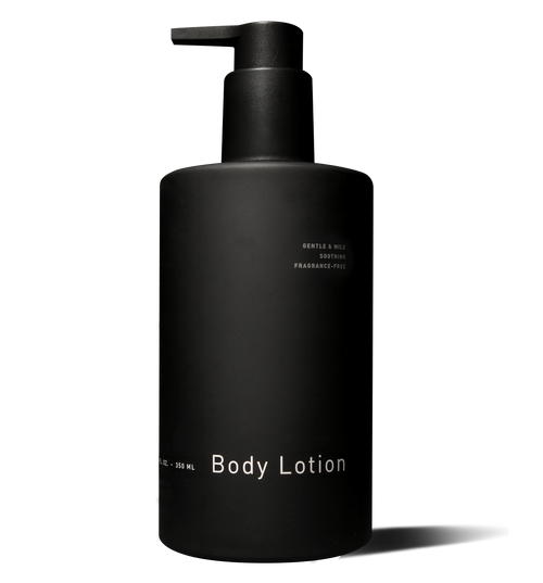 Matte black pump bottle of hawthorne Body Lotion, gentle and soothing, enriched with calming chamomile and completely fragrance-free.